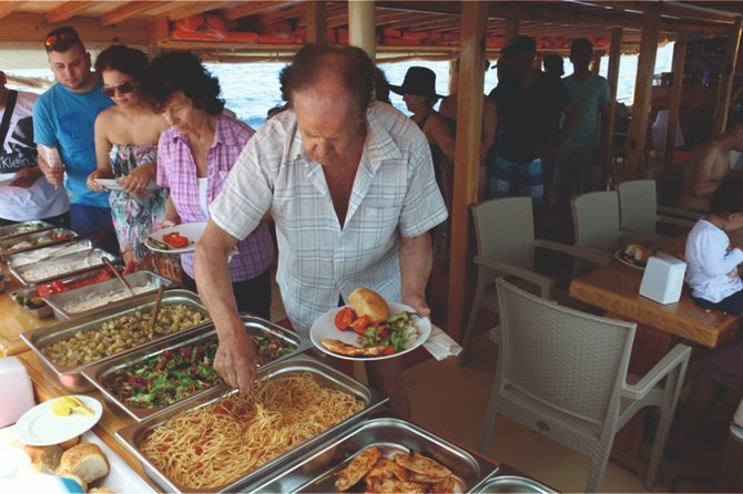 Dolphin Island Boat Trip – Swim, Sun & Lunch Included - Lunch on board: simple, local, and timed for sea-day energy
