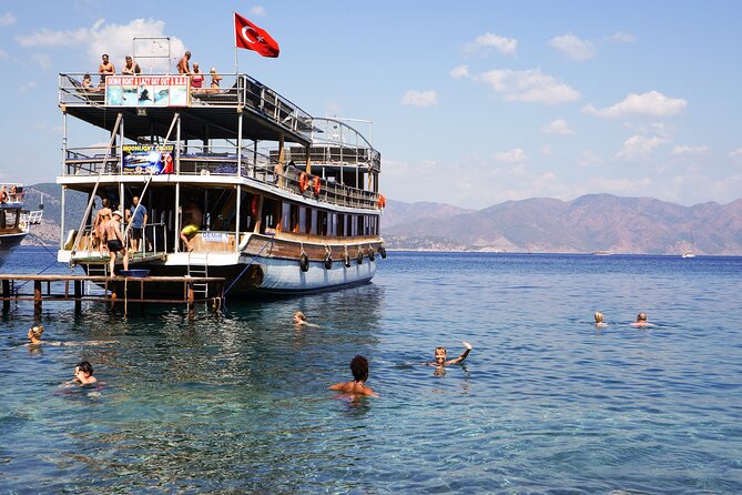 Dolphin Island Boat Trip – Swim, Sun & Lunch Included - Blue Lagoon style stop: more swimming than sightseeing